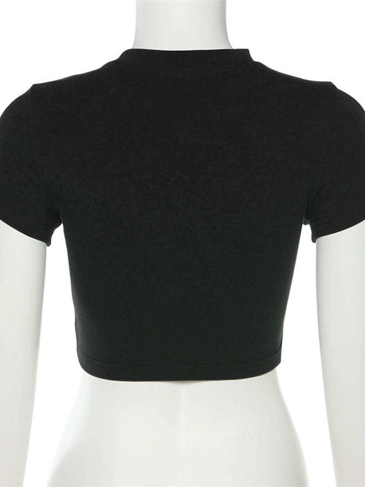 Back view of A Classy Chic Boutique black short-sleeve crew neck crop top on a mannequin