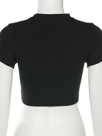 Back view of A Classy Chic Boutique black short-sleeve crew neck crop top on a mannequin