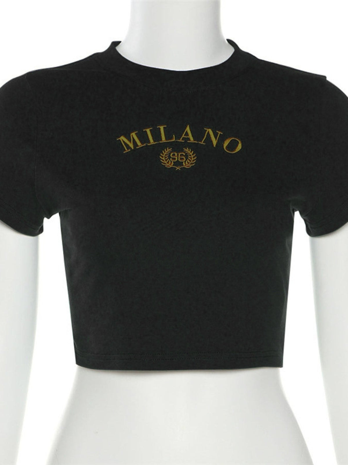 A Classy Chic Boutique black crop top with gold embroidered Milano graphic and 96 laurel wreath on a mannequin
