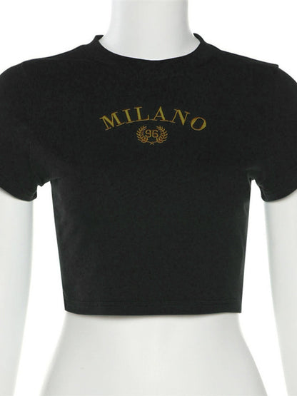 A Classy Chic Boutique black crop top with gold embroidered Milano graphic and 96 laurel wreath on a mannequin